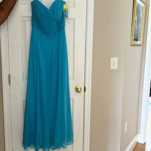 Beautiful turquoise formal dress for prom or formal affairs.